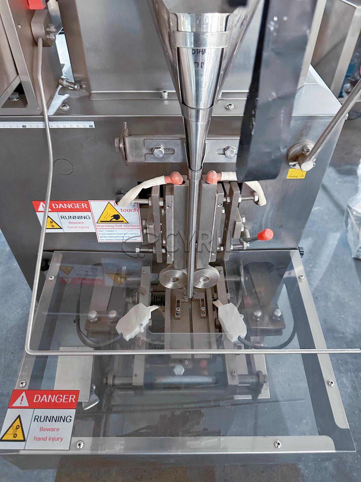 Three-edge sealing granule packaging machine