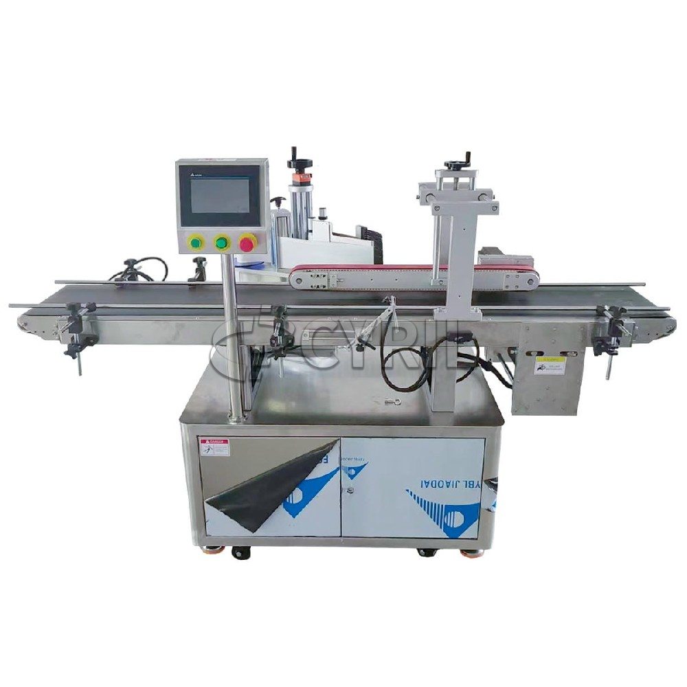 Top side labeling machine