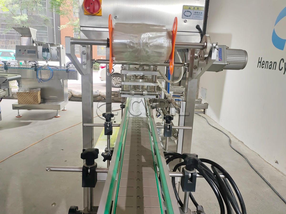Fully automatic double-head film sealing machine
