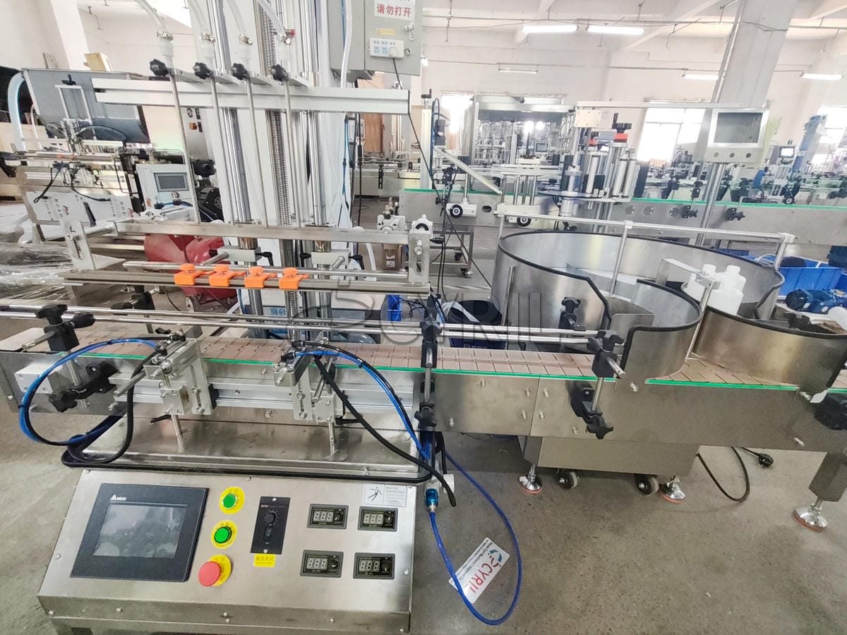 Desktop four-head magnetic pump filling machine