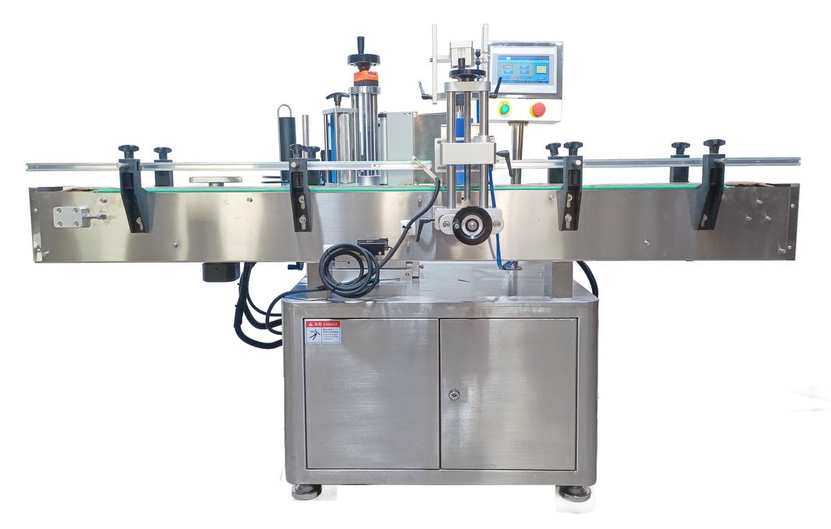 全自动圆瓶定位贴标机(加顶盖)